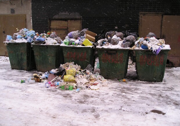 Фото kp.ua. Жители двух районов будут платить за вывоз мусора по одной квитанции.  