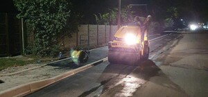 Укладывали ночью асфальт: как под Харьковом готовились к приезду Зеленского