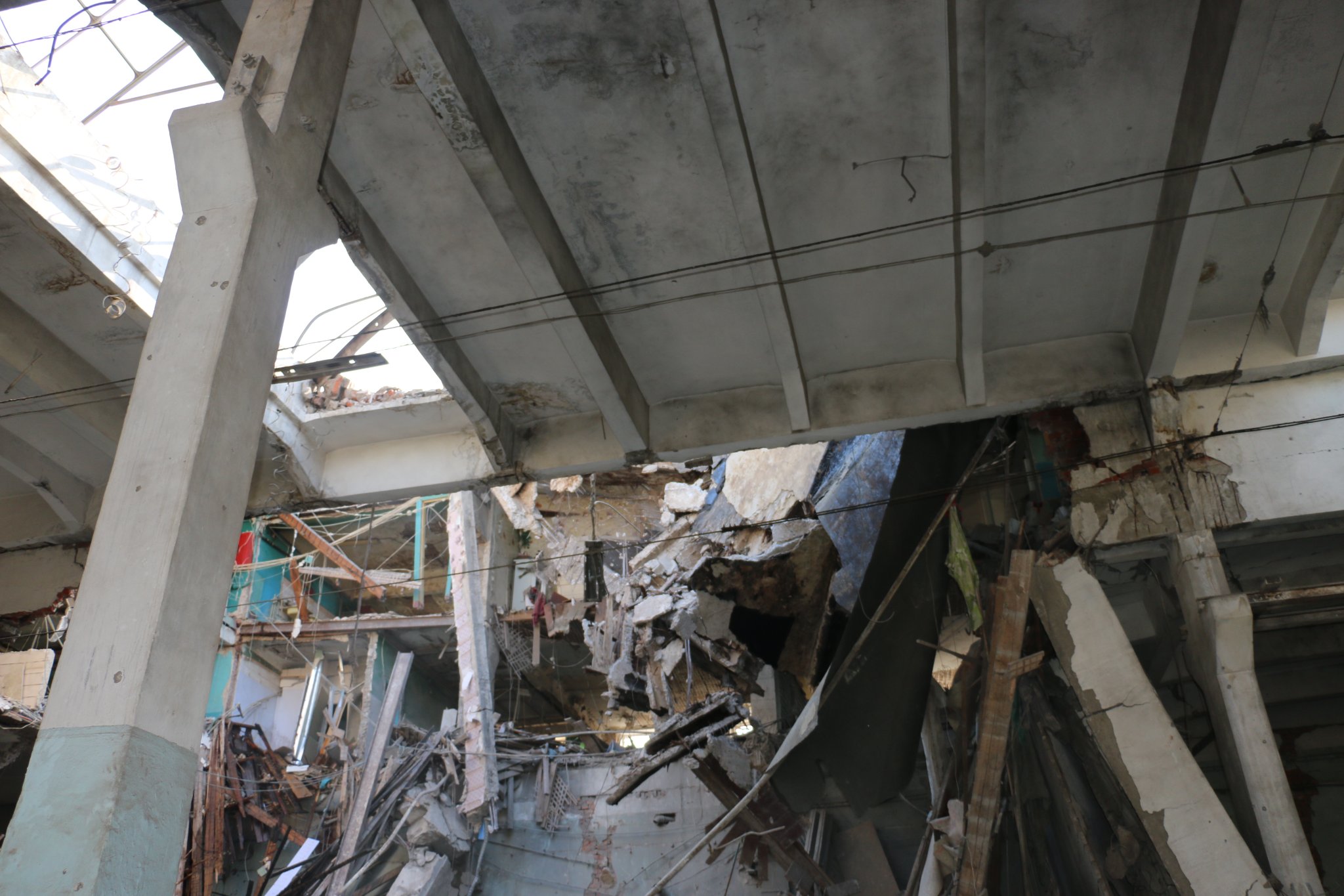 Среди жертв — переселенка: под завалами обстрелянных россиянами общежитий нашли тела 22 человек.